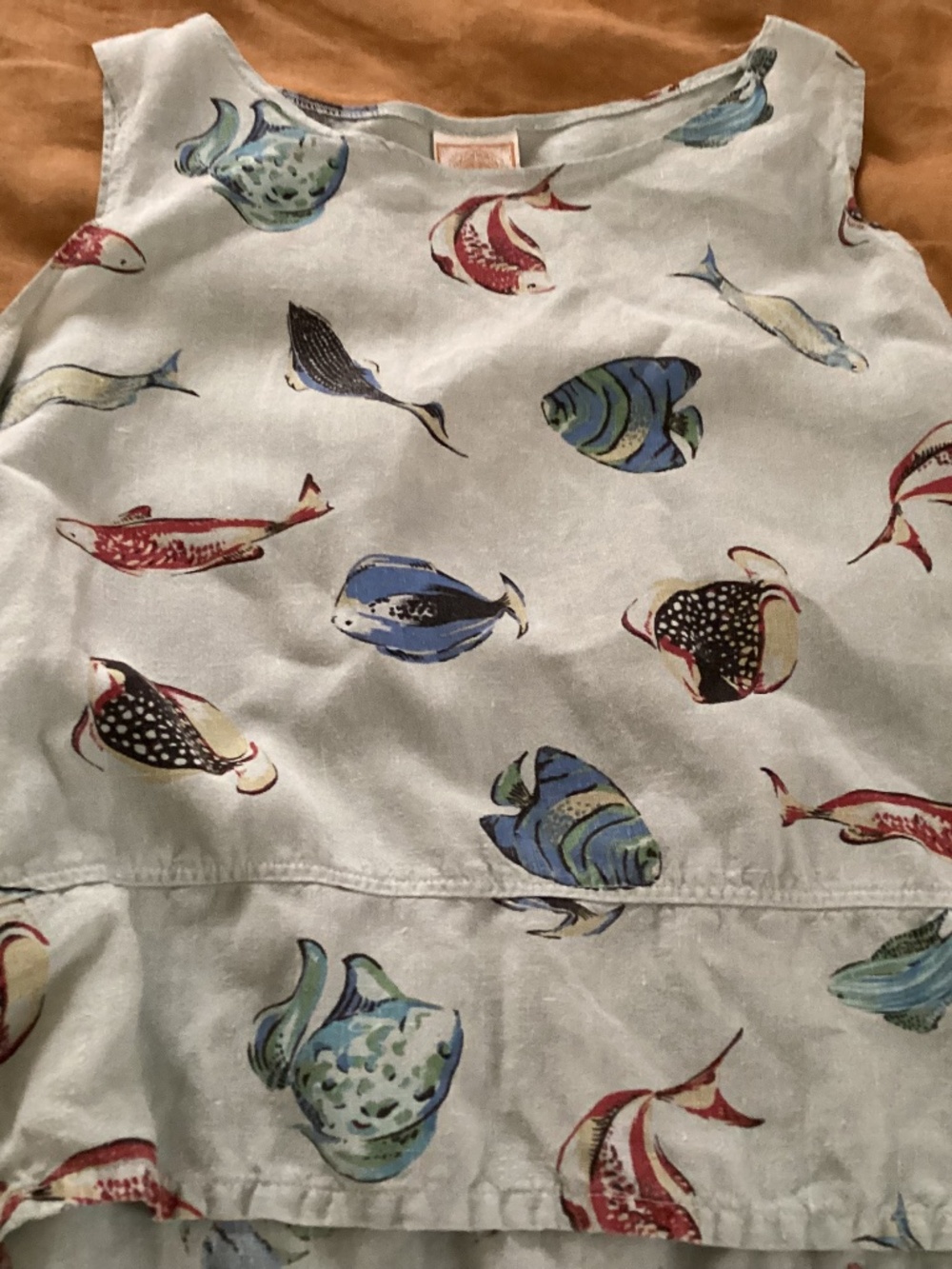 Sleeveless linen blouse something is fishy..medium roomy